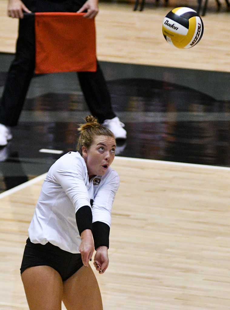 Missouri defensive specialist Riley Sents defends an Ole Miss hit during their match
